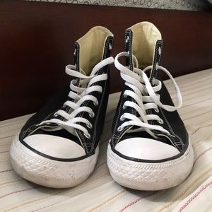 Black and white high-top converse